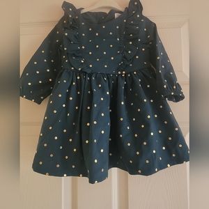 Elegant green dress with gold polka dots